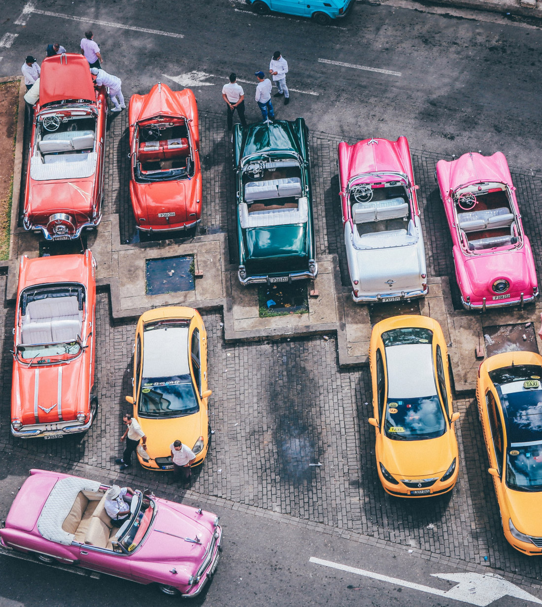 overhead-shot-assorted-cars-different-colors-parking-lot