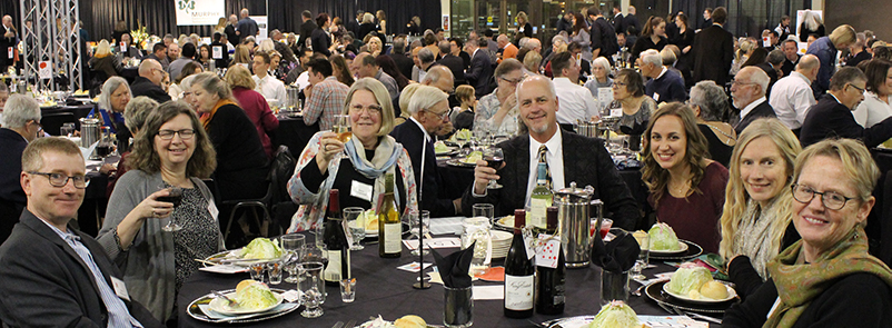 Nobody loves a live auction like Sara (center, left) of Bergsund-Delaney Architects, table sponsor with Dougherty Landscape Architects.